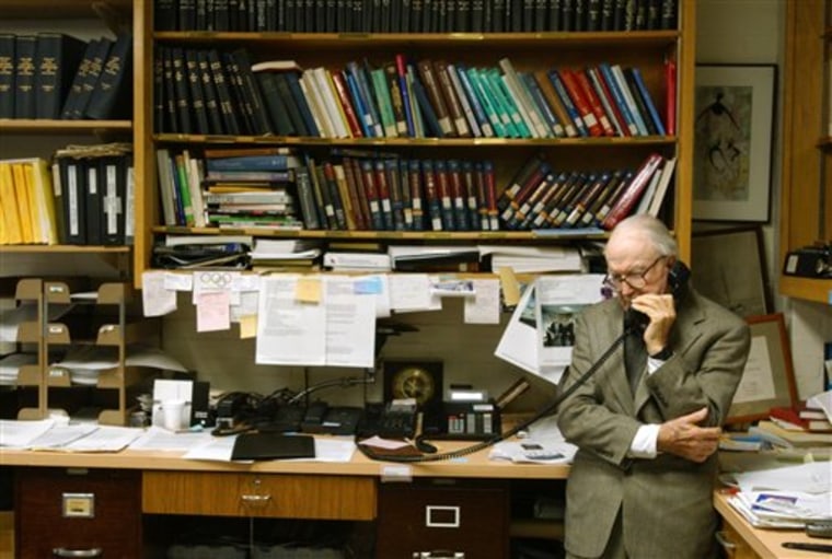 This May 22, 2003 photo shows Britton Chance, professor emeritus of biochemistry and biophysics at the University of Pennsylvania in Philadelphia, talking on the phone in his department. 